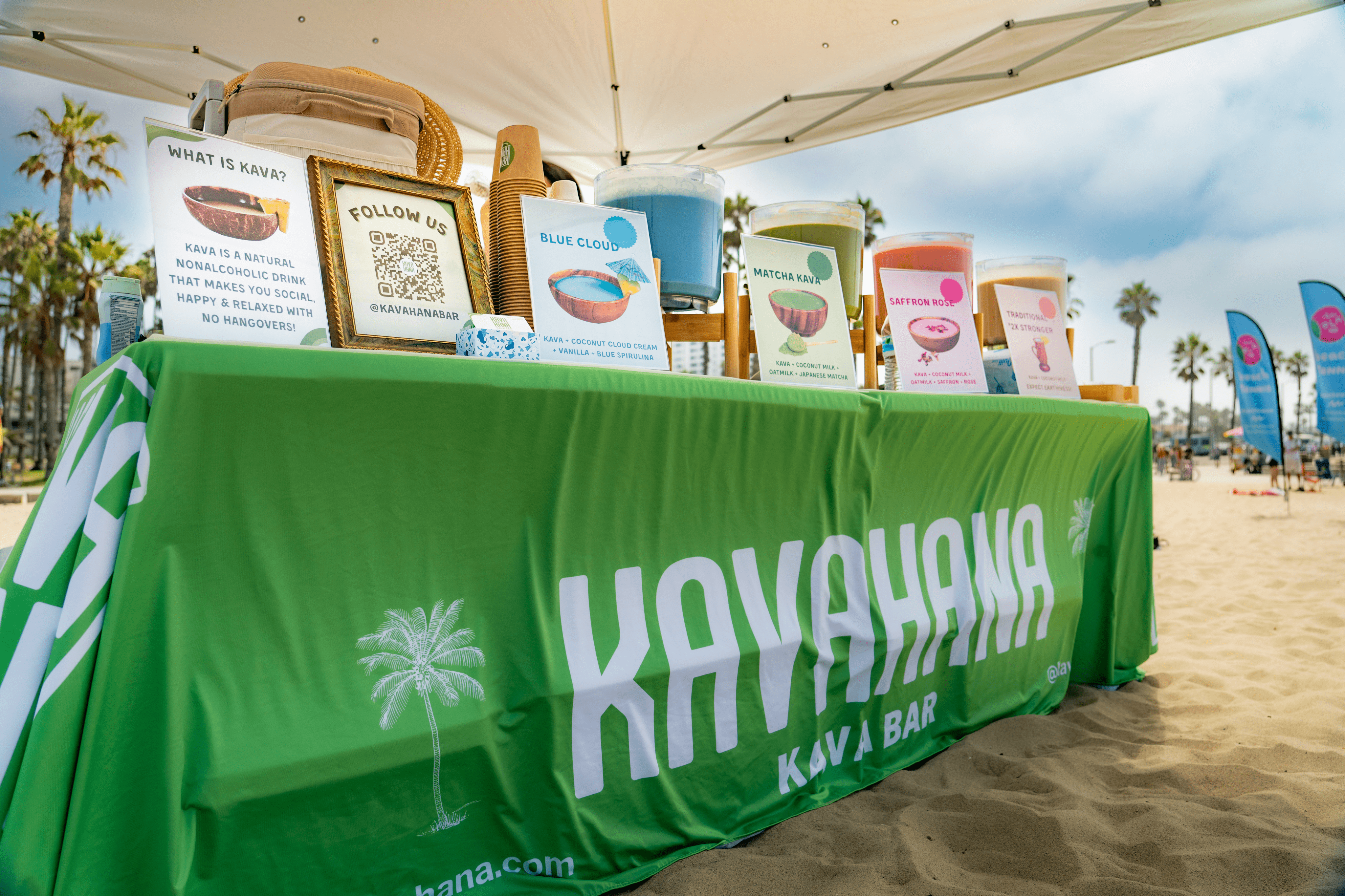 a bright, sunny photograph of Kavahana Kava Drinks on the beach in Santa Monica California